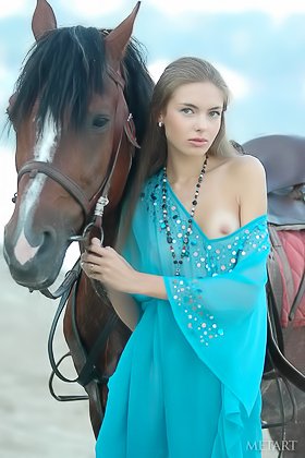 Horse girl posing next to a wild stallion in a outdoor erotic shoot Videos