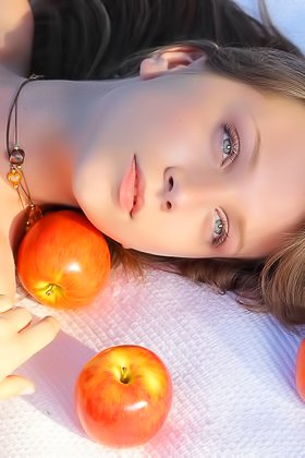 Dark-haired chick poses naked while surrounded by lots of apples Videos