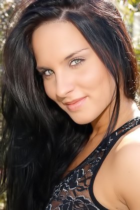 Dark-haired beauty with a bush showing off for the camera while outdoors Videos